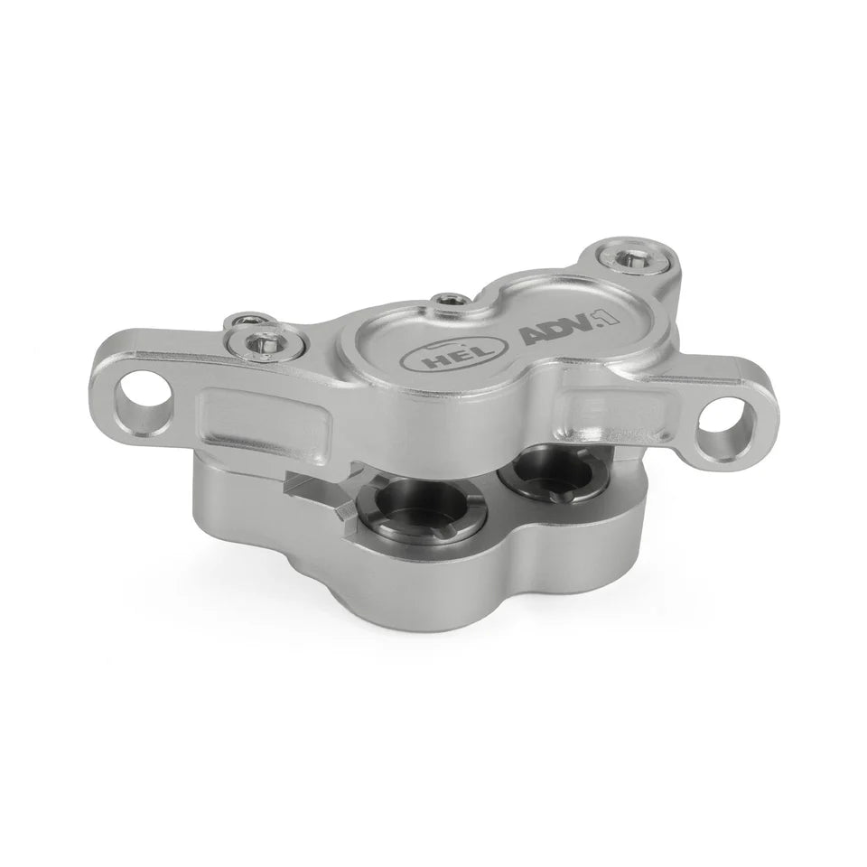 HEL Advocate ADV.1 4-piston brake caliper in silver and grey front view showing CNC-machined billet construction