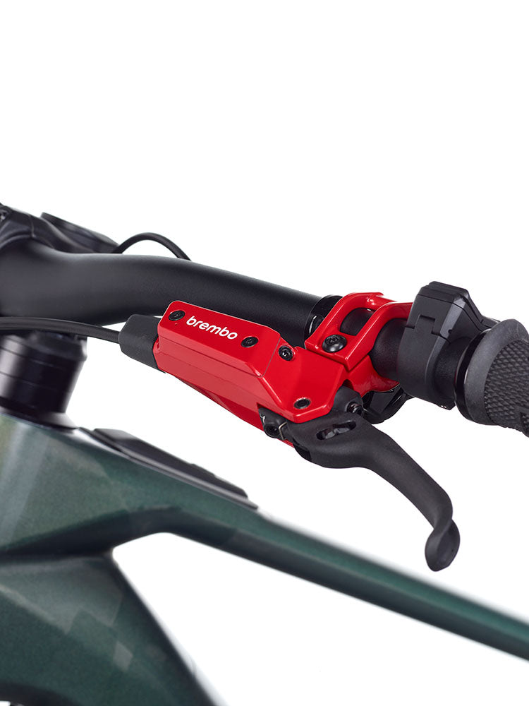 Close-up of Brembo GR-PRO red hydraulic brake lever fitted to a mountain bike handlebar for MTB and e-bike braking control