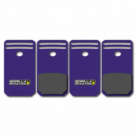 Four purple Gorilla Brakes Factory Racing Stealth disc brake pads for Magura Gustav and Clara brake calipers